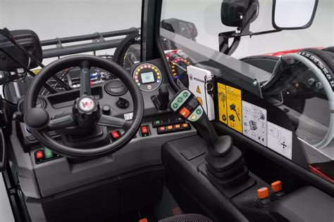 Infographic showing the cab interior and controls of the Weidemann T4512