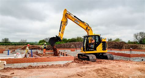 The JCB 145XR excavator with a short tail swing working on a construction site
