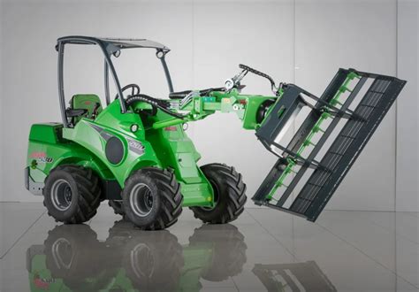 Thematic photo of Avant loader with an attachment