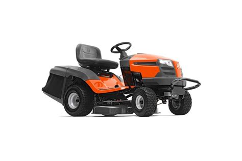 The Husqvarna TC 139T ride-on mower in action on a lawn, collecting grass