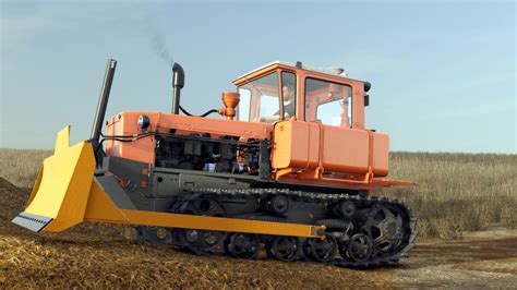 Zdjęcie ciągnika DT-75 z charakterystycznym czerwonym lakierem