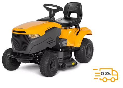 Traktor ogrodowy na tle zielonego trawnika