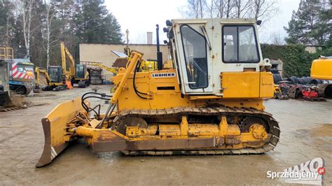 Spycharka gąsienicowa Komatsu D51EX/PX-22 podczas pracy