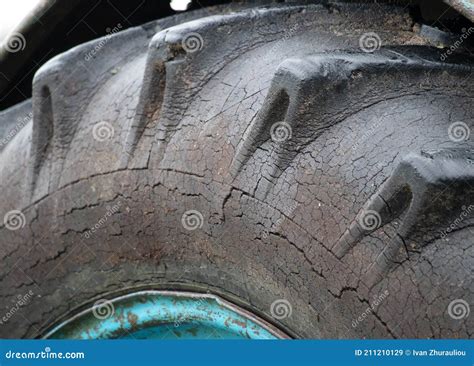 Photo of an old agricultural tire with worn tread