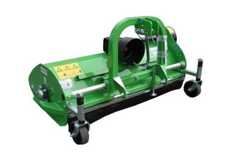 Thematic photo of a Peruzzo Fox Cross 1400 flail mower attached to a small tractor working on uneven terrain