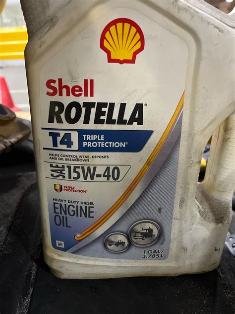 Thematic photo of a forklift engine and oil can