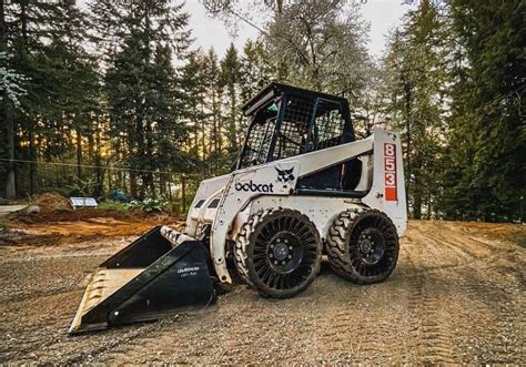 Historical photo of the first Bobcat skid-steer loader