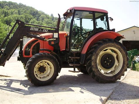 Zetor tractor struggling with heavy farm equipment