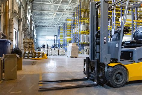 Thematic photo of a forklift in action inside a warehouse