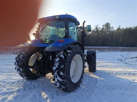 zdjęcie New Holland TS 115A w akcji na polu