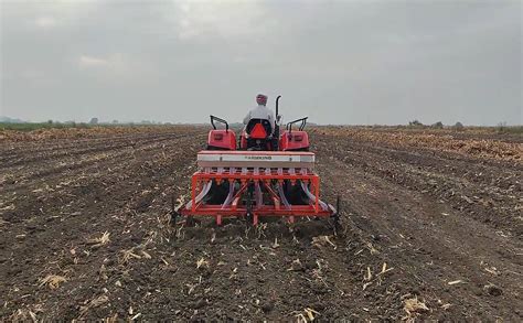 Thematic photo of Ozdoken seed drill in a field during sowing