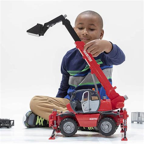 Thematic photo of a child playing with a Bruder Manitou MRT 2150 loader