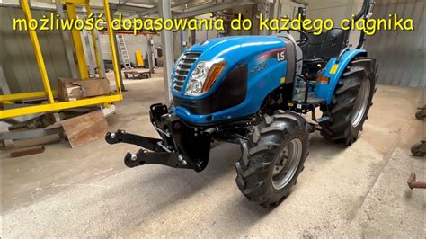 zdjęcie ciągnika Iseki w akcji, np. w polu lub podczas prac komunalnych