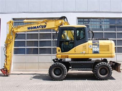 Komatsu PW160-7 wheel excavator working