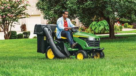 Thematic photo of a person driving a lawn tractor on a large lawn