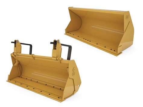 Photo showing various attachments for a Cat backhoe loader (buckets, forks, hammer)
