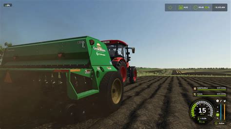 Zrzut ekranu przedstawiający proces napełniania siewnika nasionami w Farming Simulator