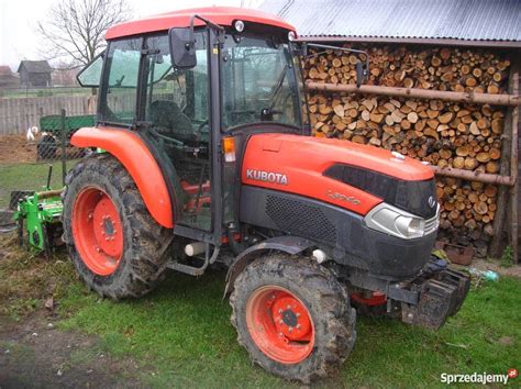 Zdjęcie przedstawiające ciągnik Kubota L5040 w pełnym wyposażeniu