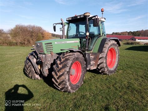 Interior of Fendt Favorit 515 C cabin showing driver's seat and controls