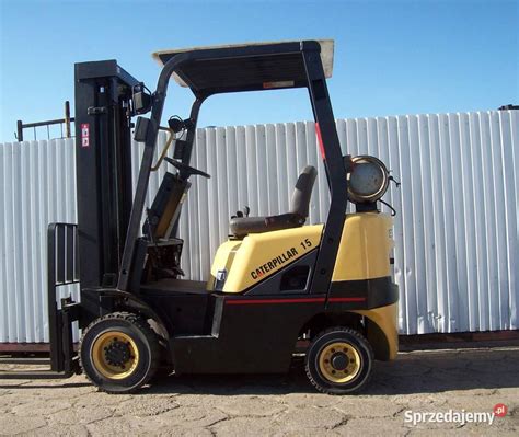 Wózek widłowy RAK na kołach bliźniaczych, transportujący ładunek