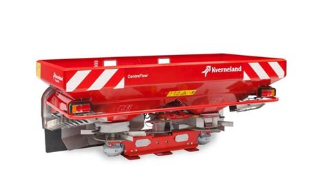 The Kverneland Exacta HL spreader with additional extensions (nadstawki), working in a field