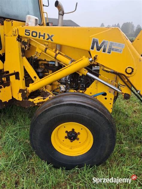 Zdjęcie koparko-ładowarki Massey Ferguson 50 HX w pracy