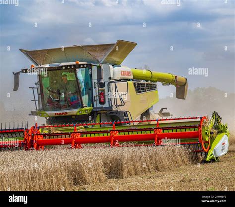 Thematic photo of a CLAAS combine harvester working in a field