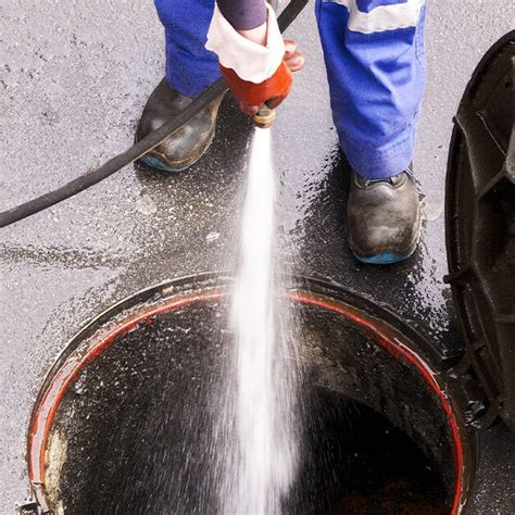 Thematic photo of a WUKO vehicle in action, cleaning a sewer line