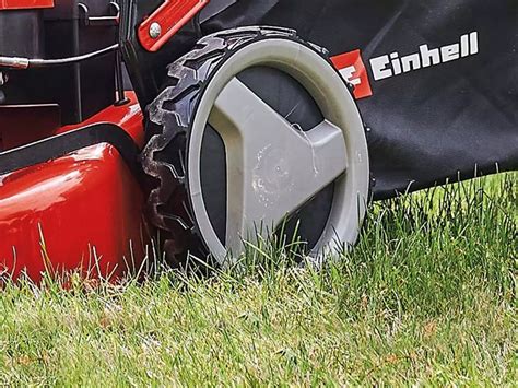 Thematic photo of Einhell GC-PM 46 S HW-E petrol lawn mower in action on a lawn