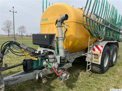 Duży wóz asenizacyjny Marco-Polo (24000 l) z hydraulicznym ramieniem