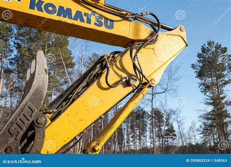 Komatsu excavator working with arm extended