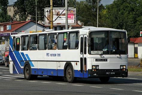 widok zewnętrzny autobusu Jelcz PR110D Lux z zaznaczonymi drzwiami i oknami
