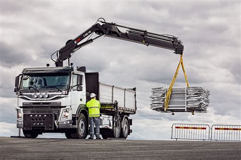 The HIAB 017T loader crane mounted on a truck, ready for operation