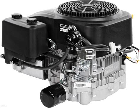 Zdjęcie przedstawiające inspekcję silnika i podwozia traktorka kosiarki