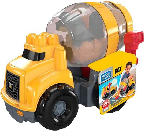 Zdjęcie betoniarki CAT Mega Bloks z klockami na placu budowy