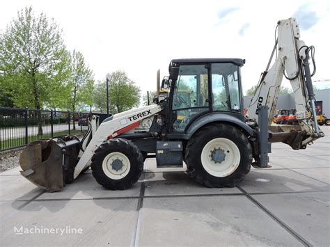 Thematic photo of a Terex backhoe loader on a construction site