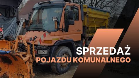 zdjęcie nowoczesnego pojazdu komunalnego na tle miasta