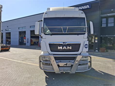 Zdjęcie wozu asenizacyjnego MAN TGS 26.360 z widoczną cysterną i pompą