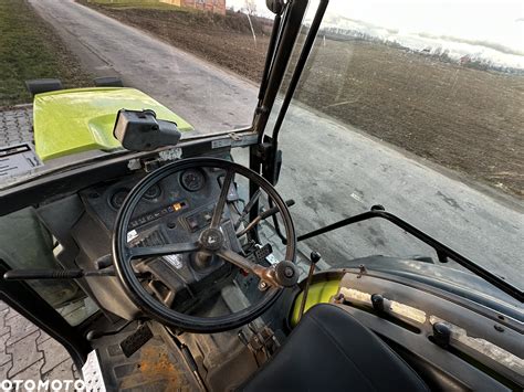 Zdjęcie ciągnika sadowniczego Renault R32 z przednim TUZ i WOM