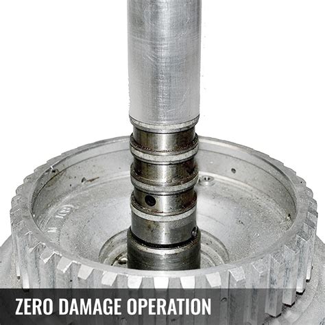 Close-up photo of a damaged Teflon seal and a shaft with excessive play.