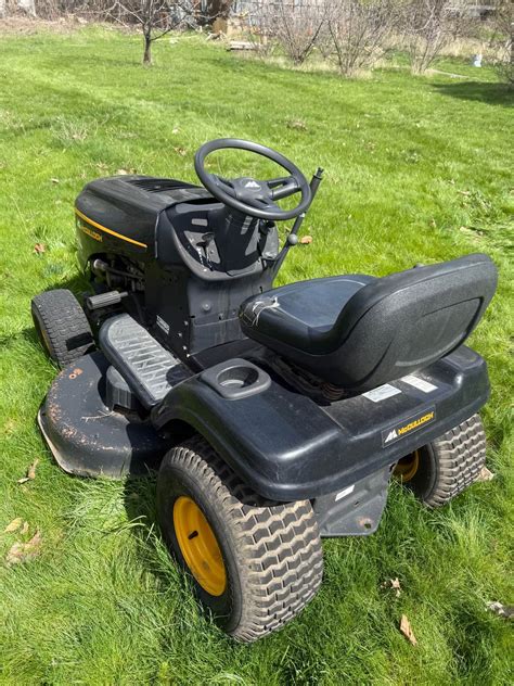 McCulloch ride-on mower with operator, highlighting comfort features