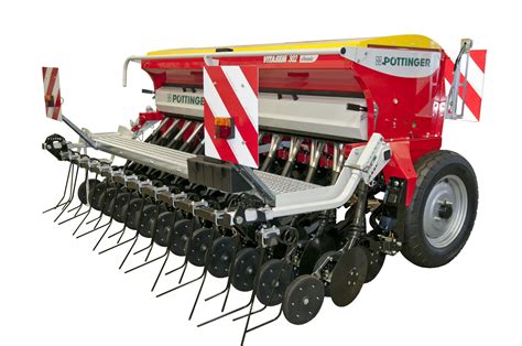 Zbliżenie na redlice dwutalerzowe siewnika Vitasem 302 z kółkami dociskowymi