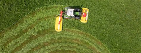 Ilustracja systemu odciążenia hydraulicznego w kosiarce Pöttinger