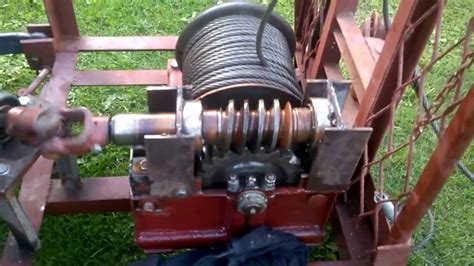 schemat budowy wciągnika linowego elektrycznego z opisem głównych elementów