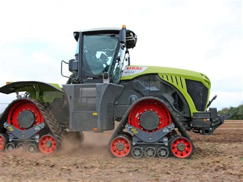 Claas Xerion TS 5000 with crawler tracks working in the field