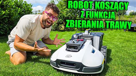 Ilustracja prezentująca kosiarkę elektryczną Ferrex z koszem na trawę i kablem zasilającym.