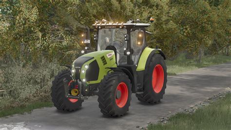 zdjęcie ciągnika Claas Arion 610 Trend z przednim ładowaczem