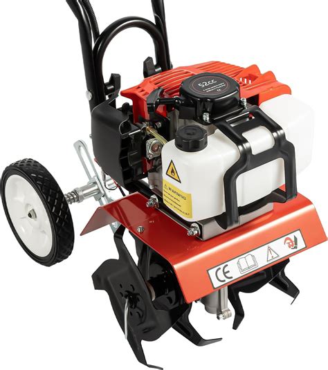 Thematic photo of a person operating a petrol rotavator in a garden