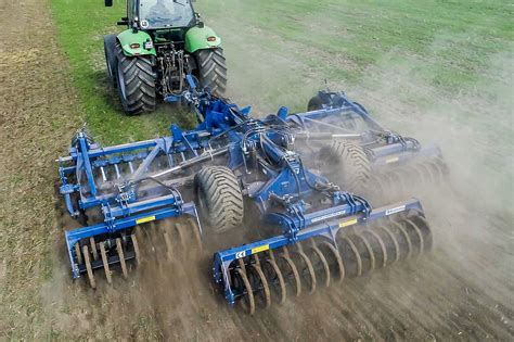 Thematic photo of a Rolmako disc harrow working in a field