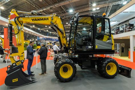 Thematic photo of a Yanmar wheeled excavator at a construction site